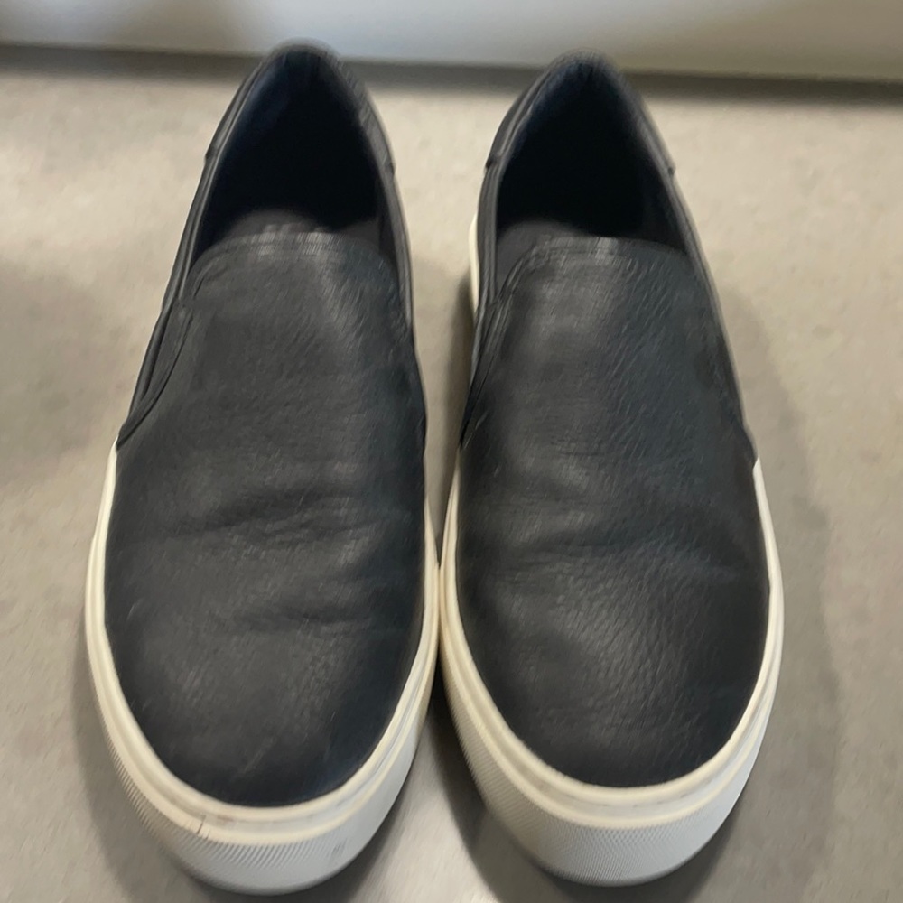 Black leather UGG slip on sneakers